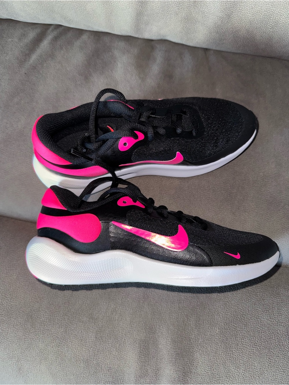 Nike Kids Black Sneakers with Pink Accents